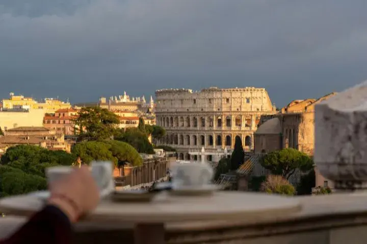 Rome Travel Guide, Colosseum at Sunset with Coffee, Rome