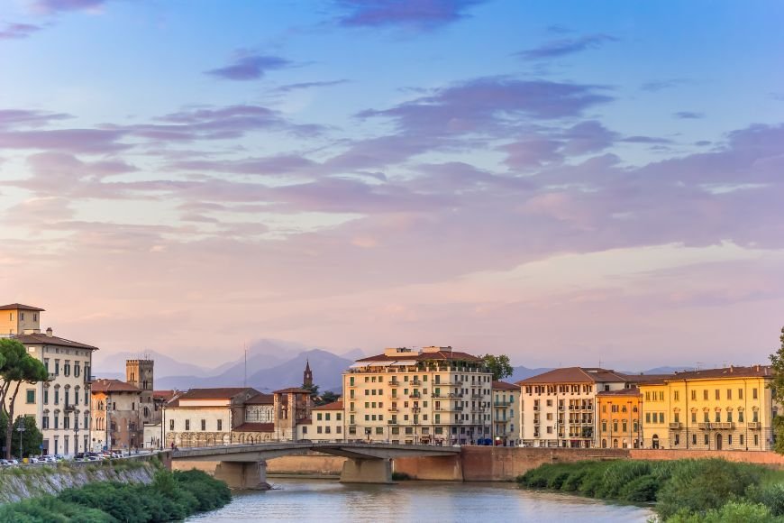 Day Trips From Florence, Arno River and colorful buildings in Pisa old town