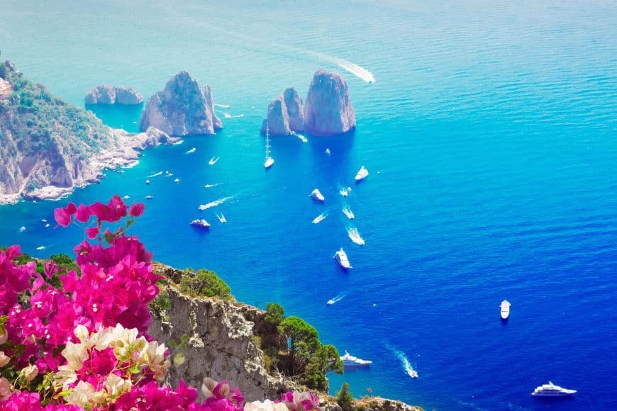 Things to Do in Naples, Capri island coastline with Faraglioni rocks