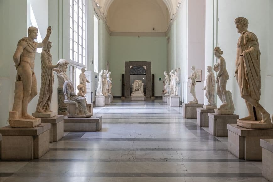 Naples Travel Guide, Interior of Naples National Archaeological Museum with classical sculptures