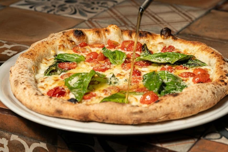 Things to Do in Naples, Neapolitan pizza with soft crust and fresh mozzarella