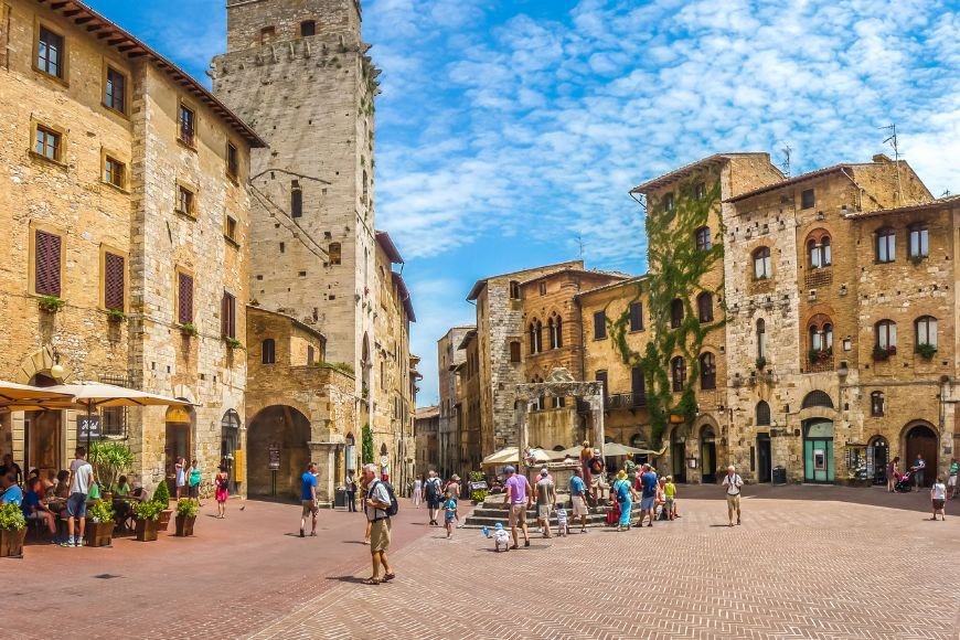 Day Trips From Florence, Piazza della Cisterna in San Gimignano with historic buildings
