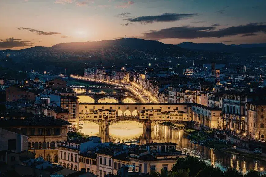 Best Attractions in Florence, Ponte Vecchio bridge at sunset — iconic Florence landmark over the Arno