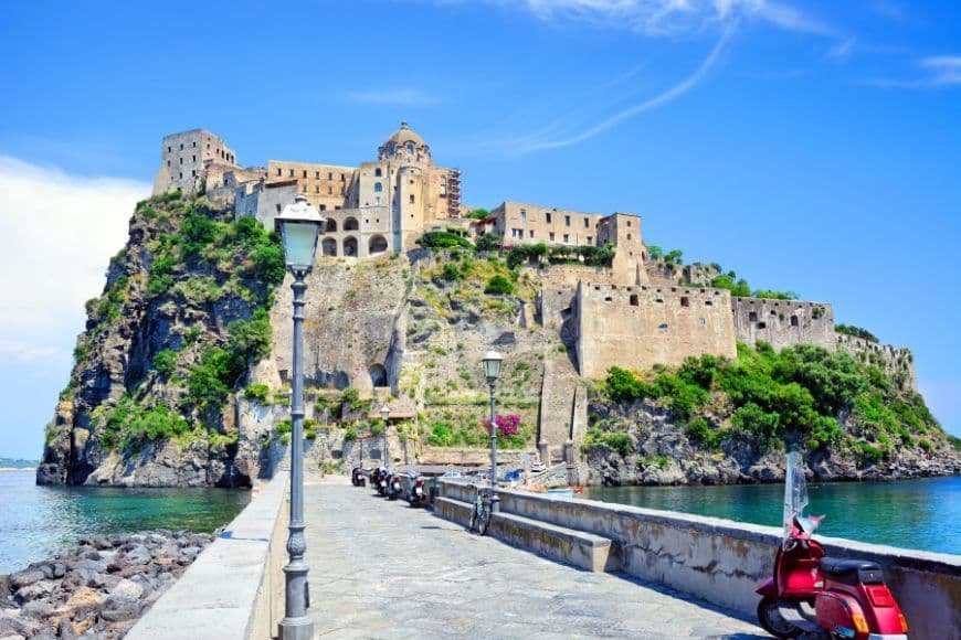 Day Trips From Naples, Castello Aragonese rising above the sea on the island of Ischia