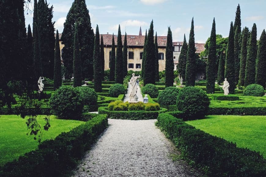 Things to do in Verona, Giardino Giusti garden terraces with cypress trees and statues