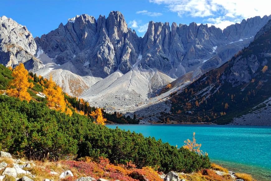 Dolomites Itinerary, Lago di Dobbiaco peaceful alpine lake shoreline