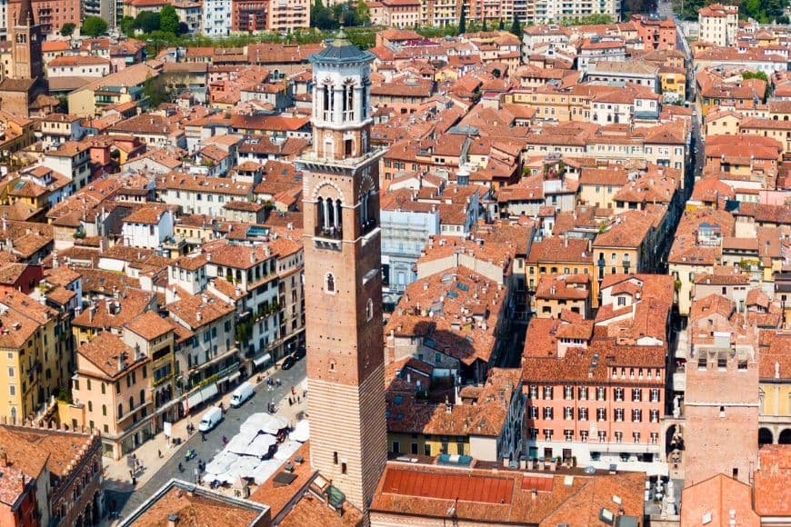 Things to do in Verona, Torre dei Lamberti rising above Verona rooftops