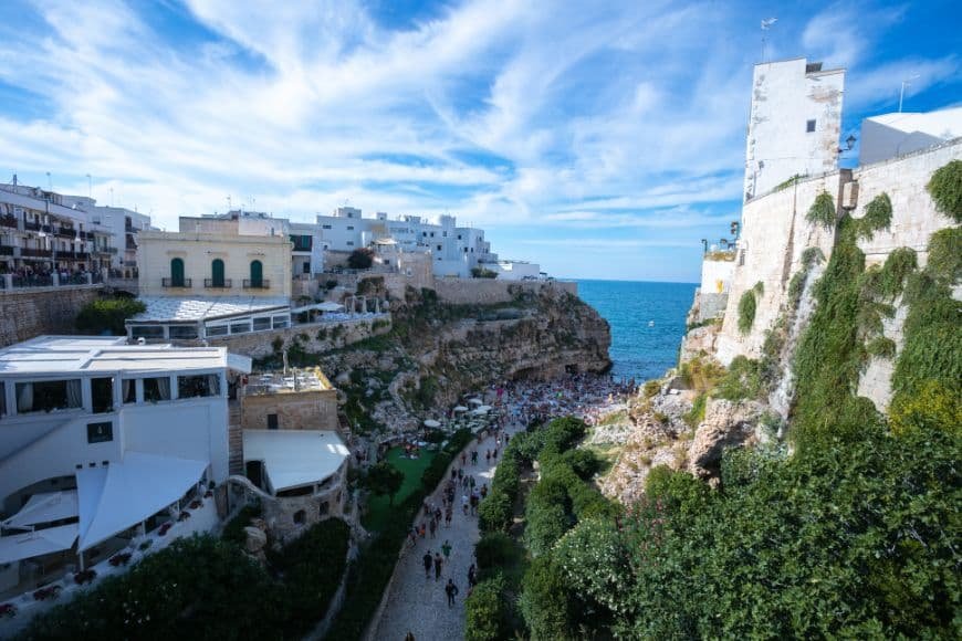 Bari Travel Guide, Polignano a Mare cliffs and beach view, Italy