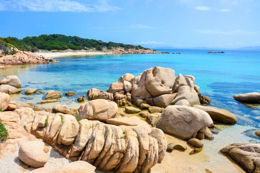 Southern Italy Travel Guide, Sardinia beach crystal clear water costa Smeralda
