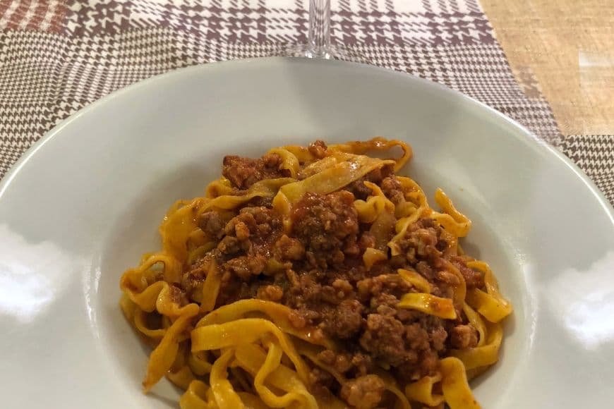 Bologna Travel Guide, Traditional tagliatelle al ragù dish in Bologna Italy
