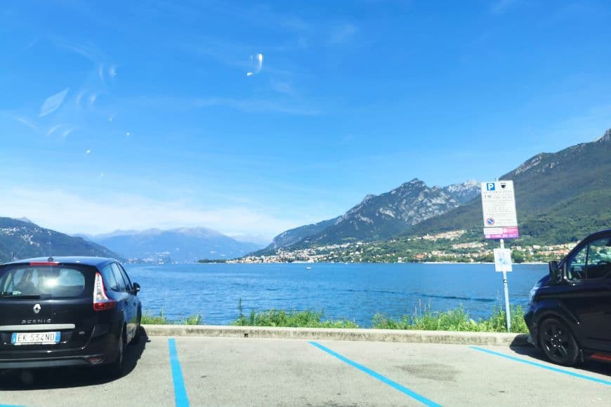 Is it hard to drive in Italy as a tourist, The parking spot we all dream about near Bellagio with Lake Como view