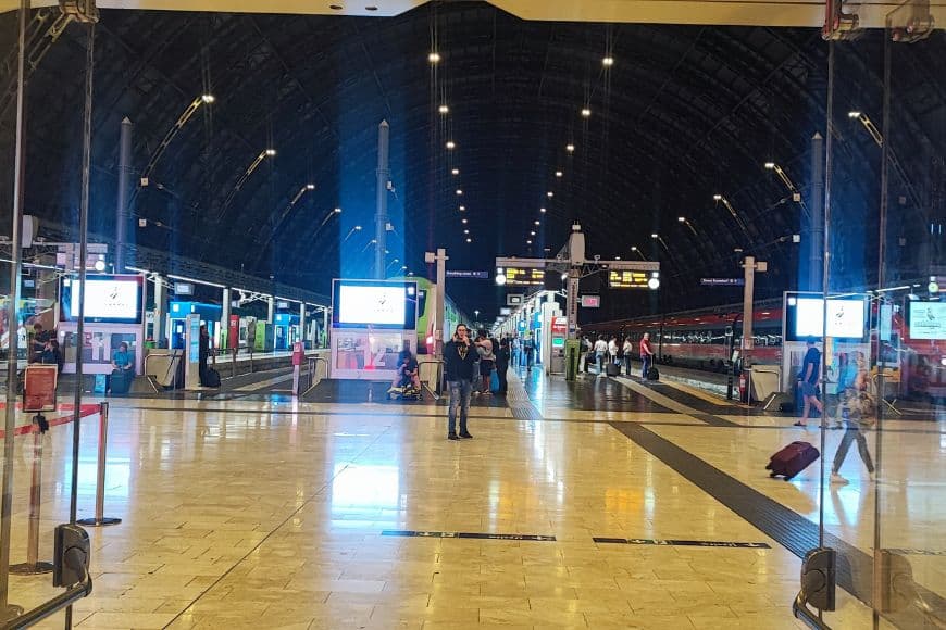 Train Travel in Italy, Train Platform At Italian Station With Trains