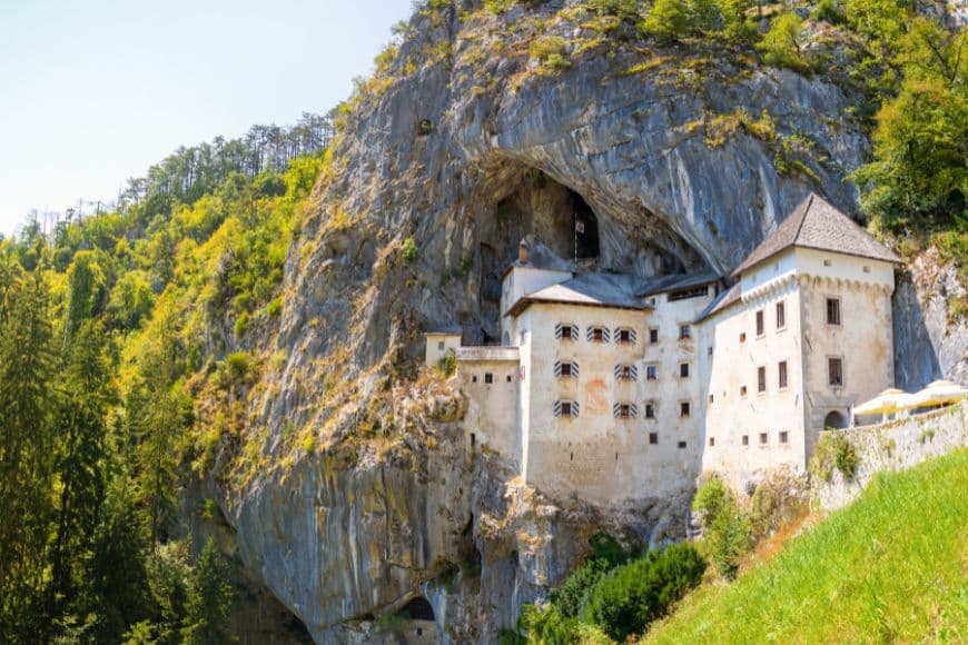 Slovenia Itinerary, Predjama Castle built dramatically into the face of a limestone cliff