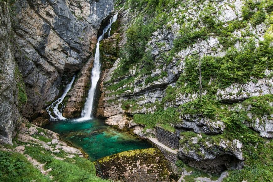 Slovenia Itinerary, Savica Waterfall surrounded by lush forest in Triglav National Park