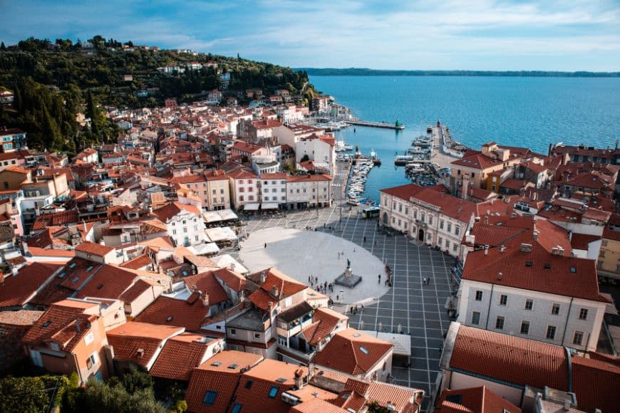 Slovenia Itinerary, Tartini Square surrounded by colorful Venetian buildings in Piran