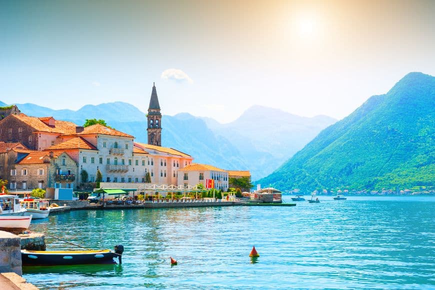 Montenegro Travel Guide, Perast waterfront and mountains along the Bay of Kotor