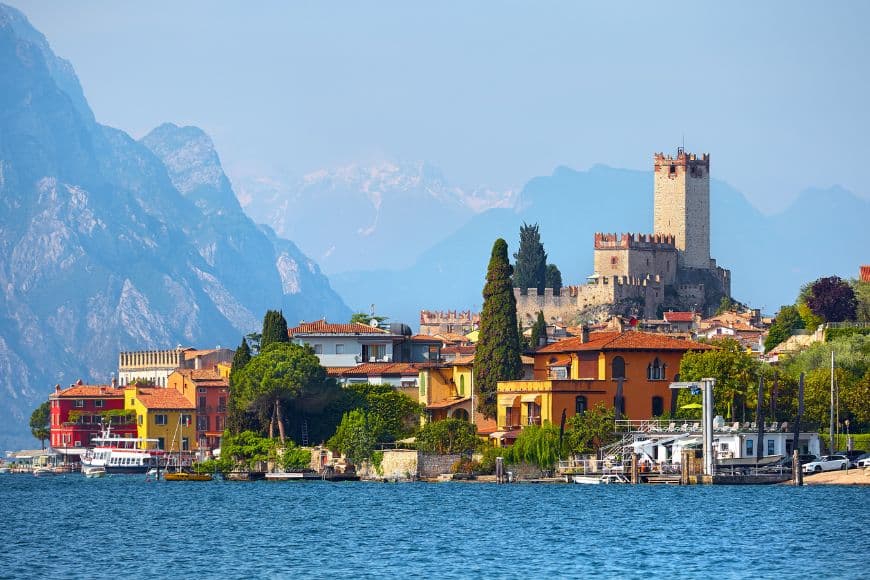 Small Towns in Italy to Visit, Malcesine historic town and mountains beside Lake Garda