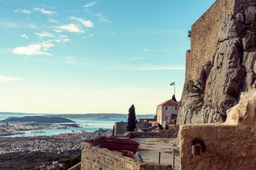 Medieval stone walls of Klis Fortress overlooking Split and the Adriatic Sea, Day Trips From Split