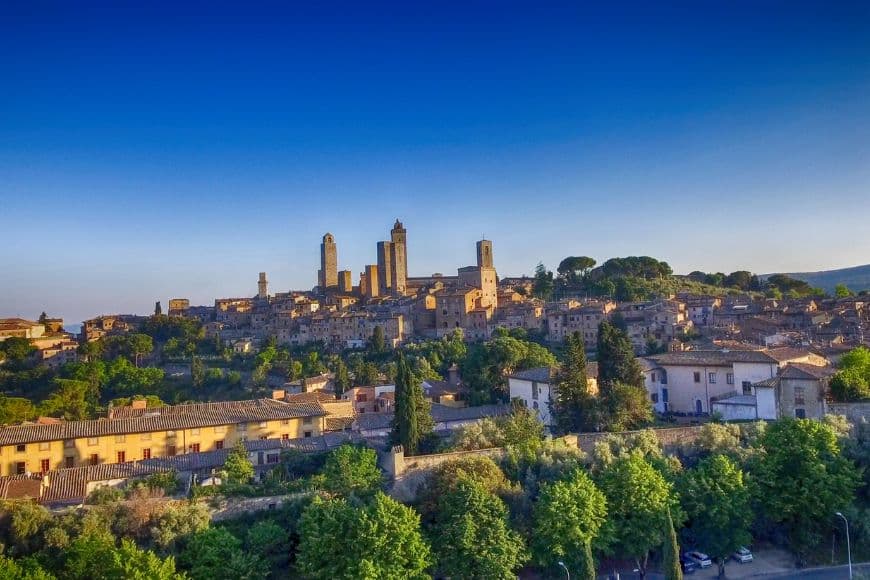 Do You Need A Car in Tuscany, Medieval towers of San Gimignano rising above the Tuscan countryside