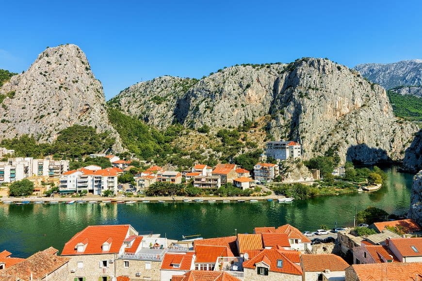 Omiš town between dramatic limestone mountains and the Cetina River. Day Trips From Split