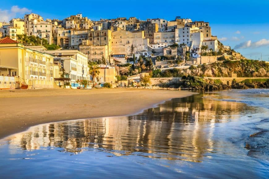Whitewashed buildings of Sperlonga overlooking sandy beaches and the Tyrrhenian Sea, Day Trips From Rome